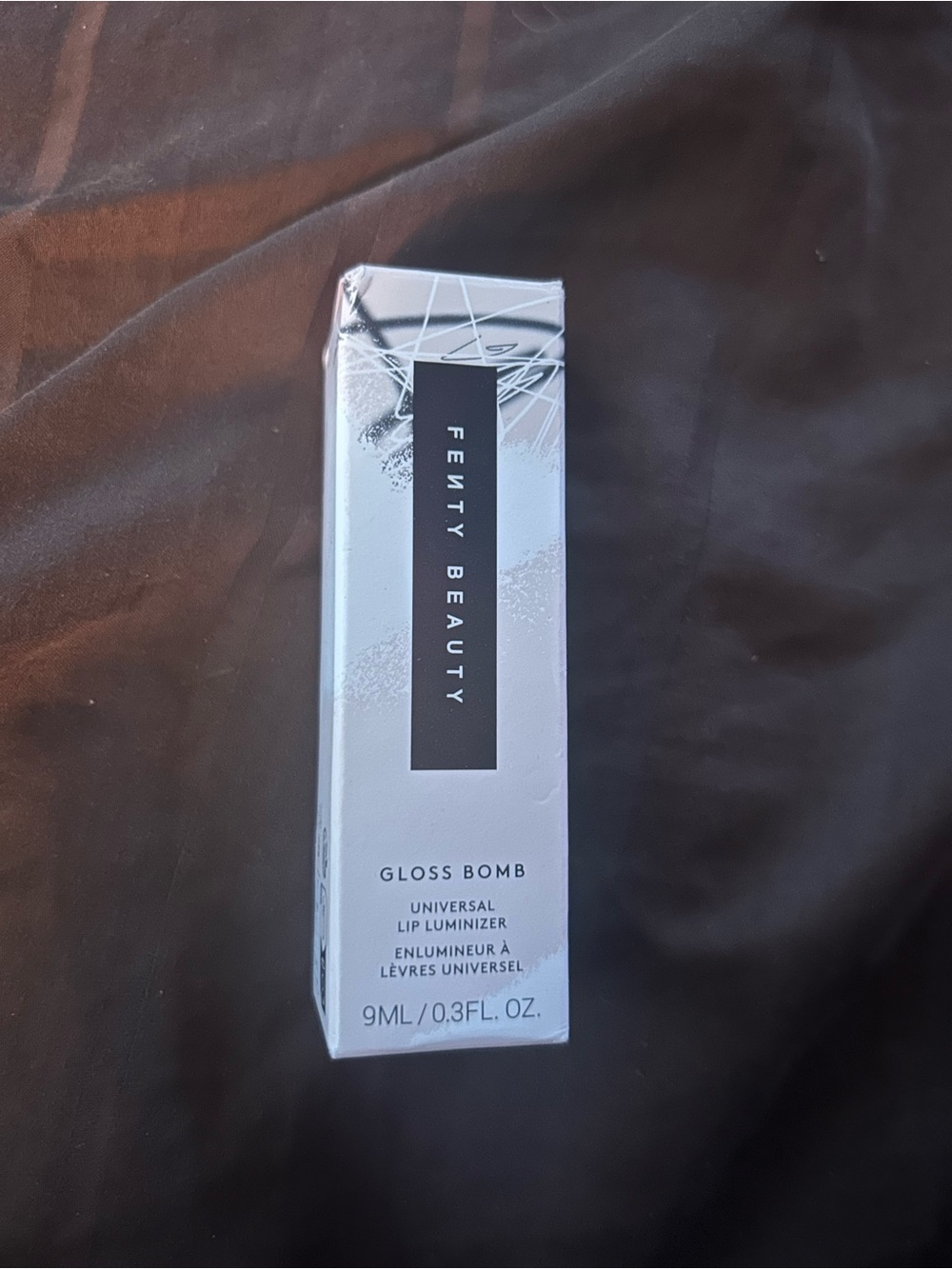 Fenty Beauty Gloss Bomb in shade, Wattabrat